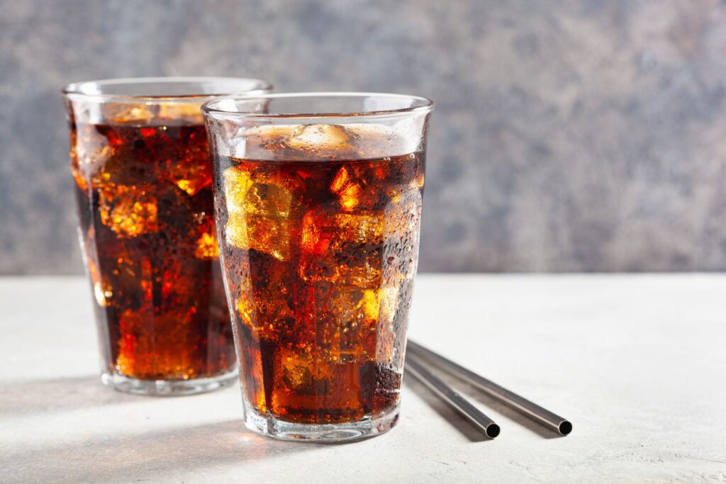 glass of cold soft drinks and foods To avoid for weight loss