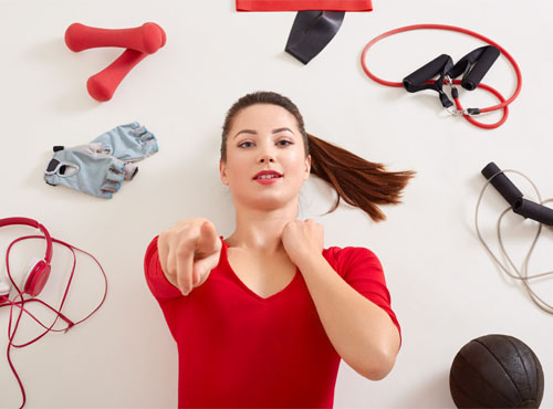 lady checking Fitness Equipment